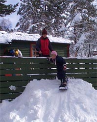 Kamilla on snowboard